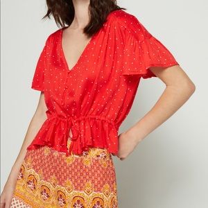 Revolve Cropped Mink Pink Polka Flutter Sleeve